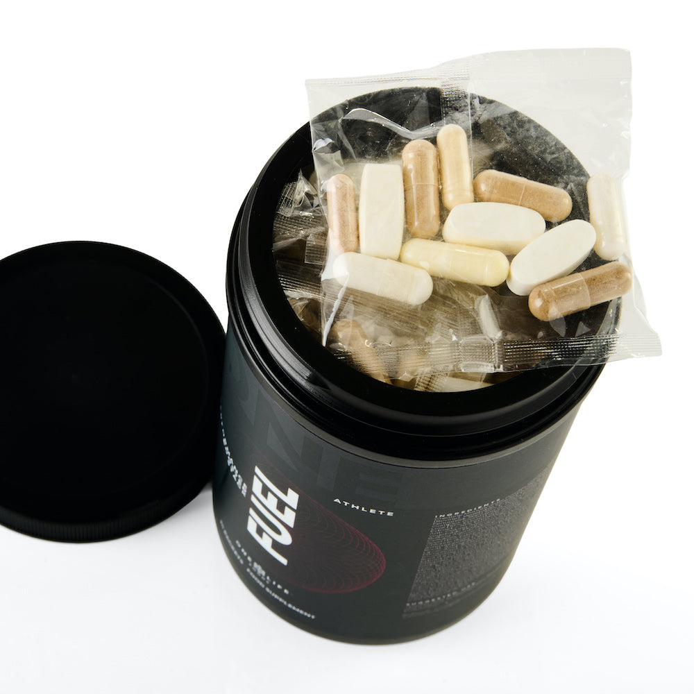 One Life Foods FUEL performance stack jar with daily capsule and tablet pack inside.