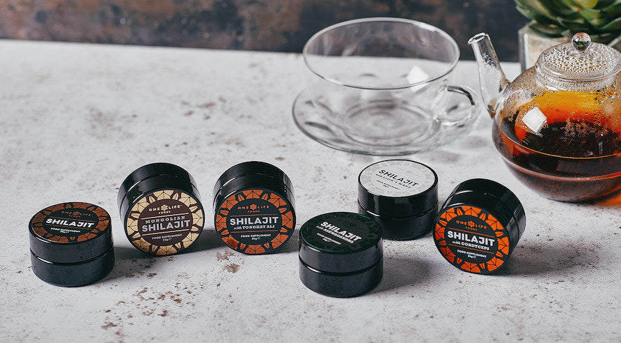 Various One LIfe Foods shilajit products on a table.