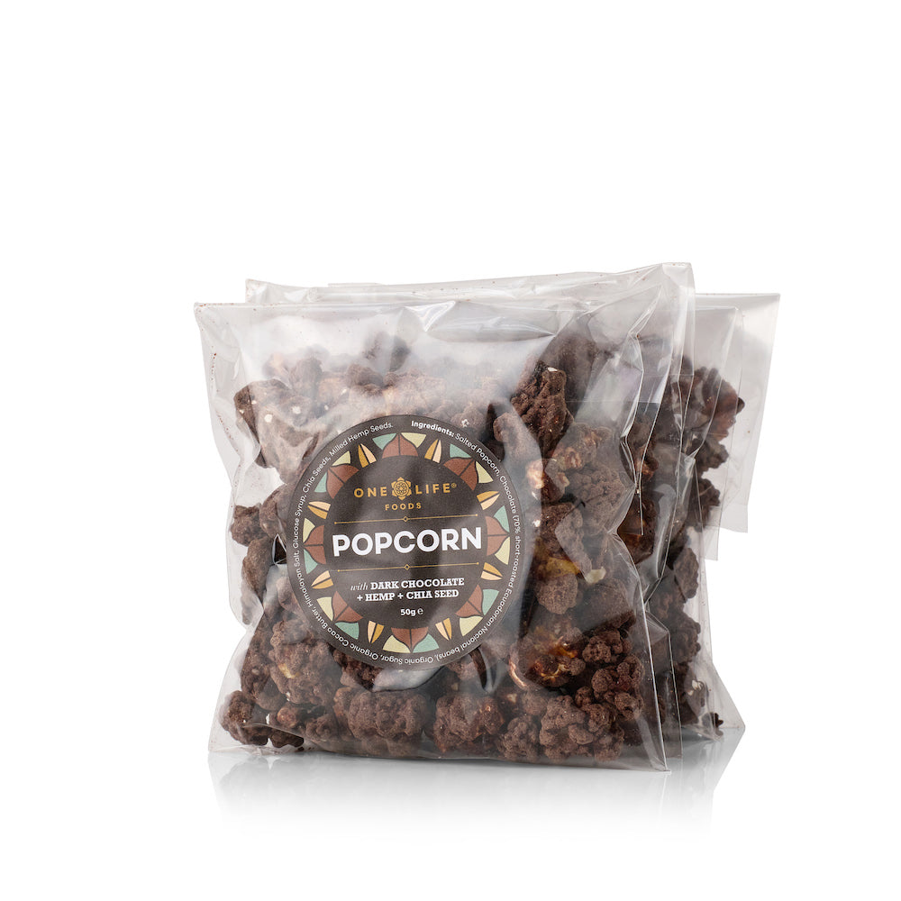 Dark chocolate, chia and hemp popcorn in 50g bag by One Life Foods