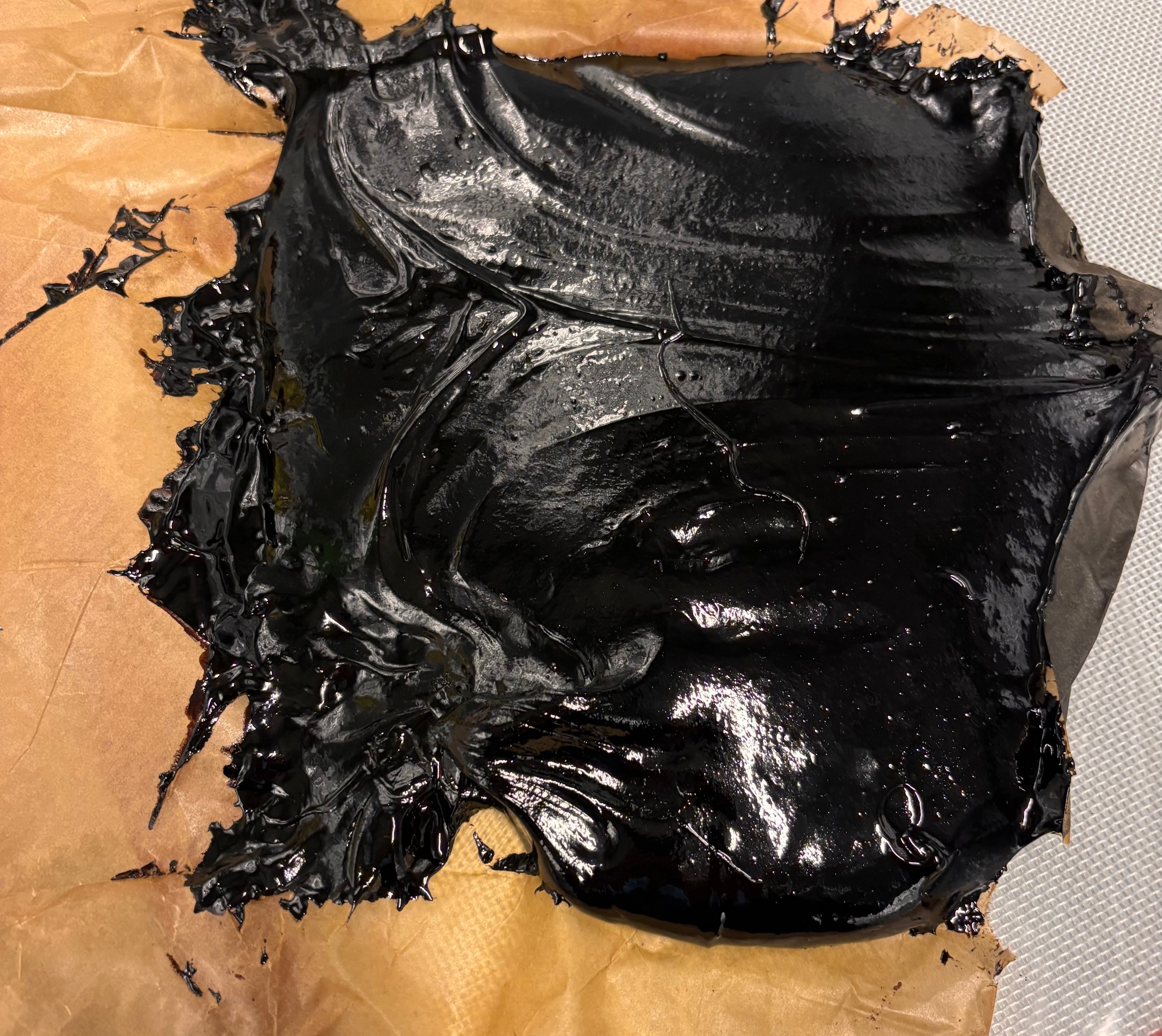 Altai Shilajit resin on brown kraft paper