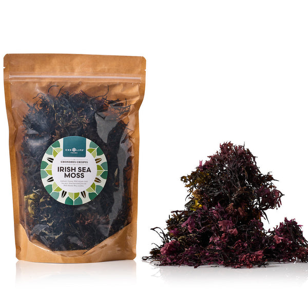 One Life Foods Irish Sea Moss in a resealable pouch beside a small pile of dried sea moss on a white background.