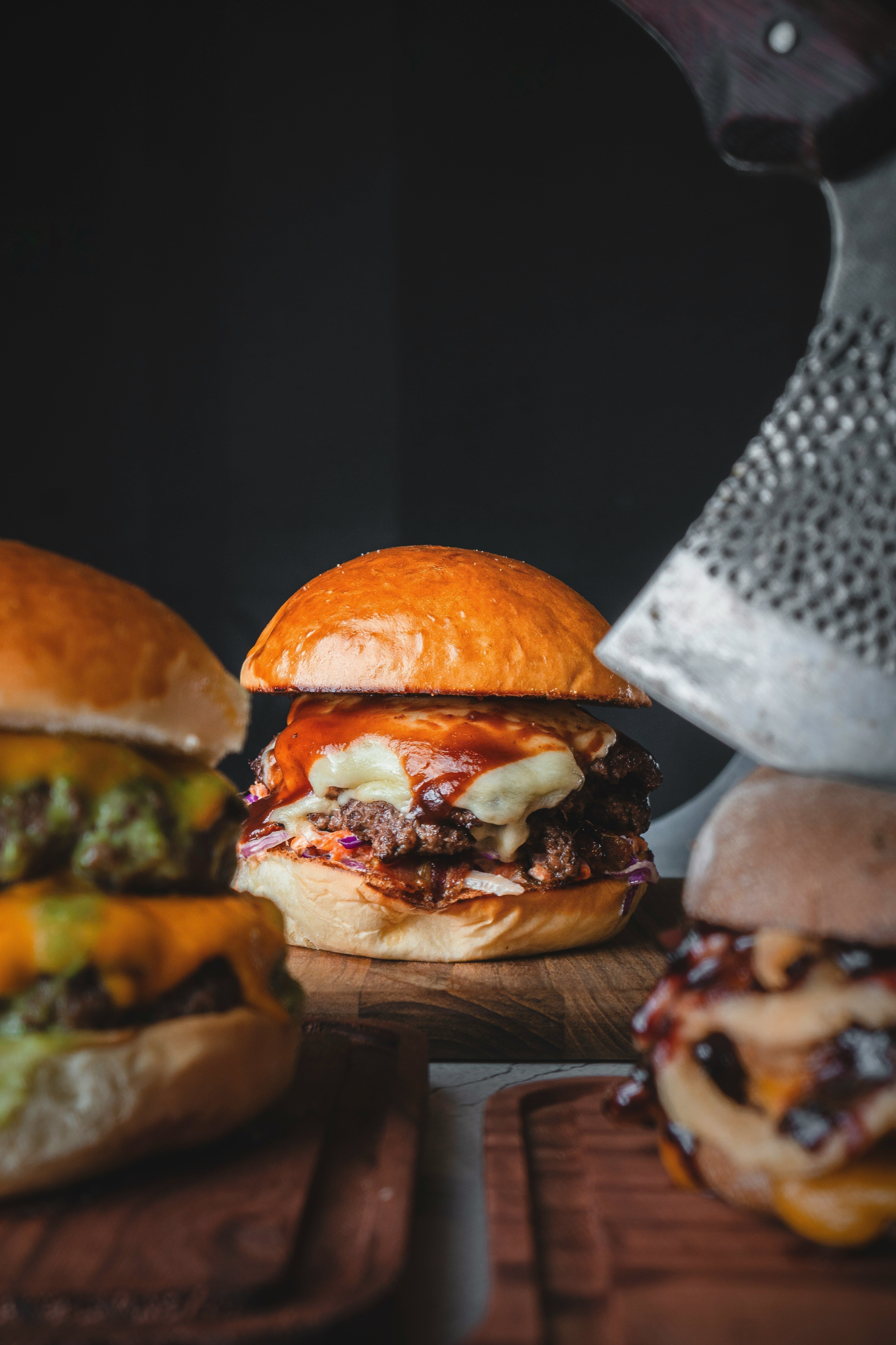 Burgers on a kitchen table to represent the cheat meal