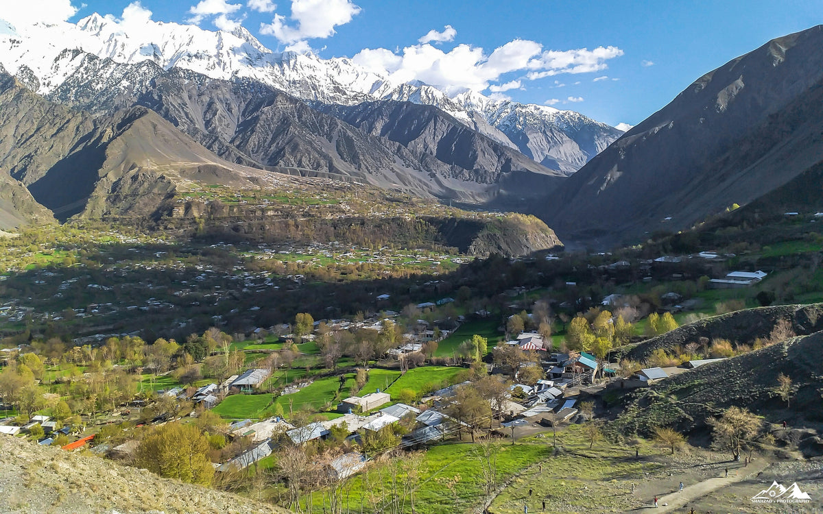 Hindu Kush mountains near Chitral, northern Pakistan, with green valleys and snow-covered peaks