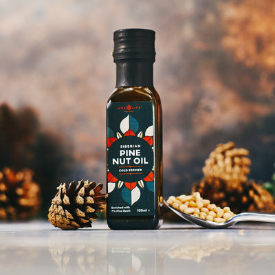 Siberian pine nut oil cold pressed with pine cones and pine nuts