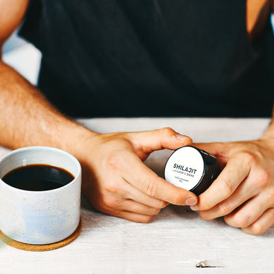 Shilajit and Lion’s Mane resin jar held with coffee for daily use.