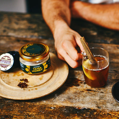 Hot toddy made with honey and shilajit in glass