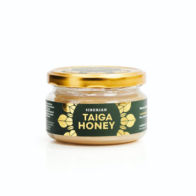 Siberian wild forest taiga honey jar with label and gold lid